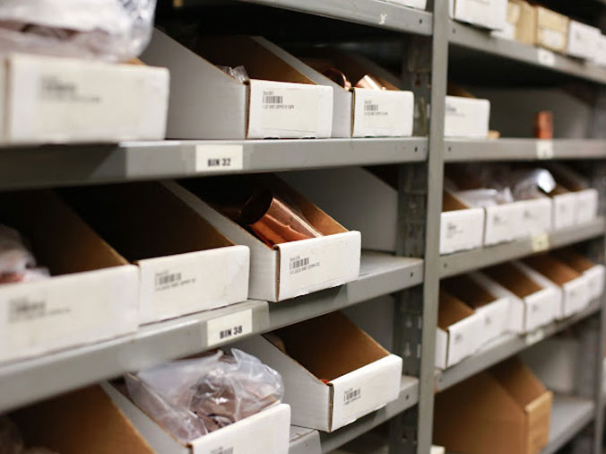 Hajoca Harrisburg brass pipe fittings on shelves